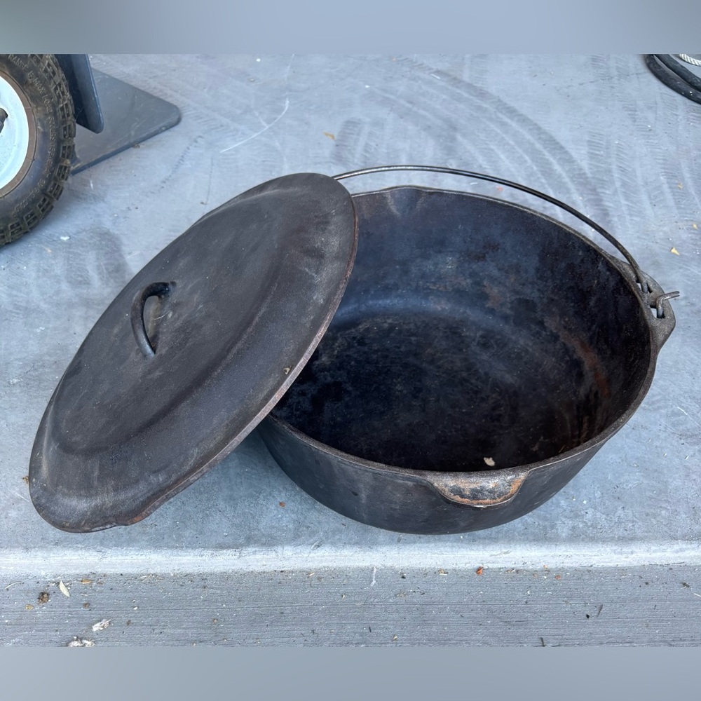 Vintage Black Cast Iron Dutch Oven with Lid and Bail Handle